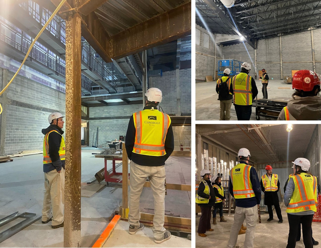 Members of the Nashoba Regional School Committee and the NRHS Building Project Committee wearing hard hats and vests while touring the new NRHS.