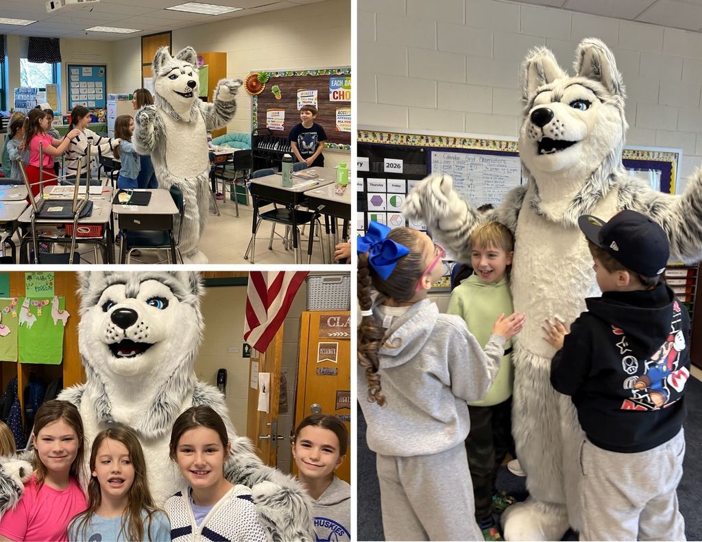 MRE students pose with the MRE Husky mascot.