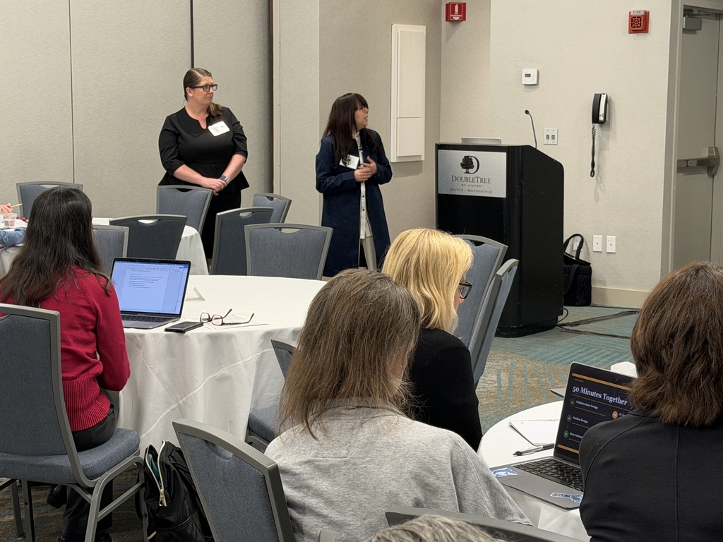 Dr. Elias and Principal Coppinger present in front of a group at the Future Ready Elementary DLCS Labs Conference.