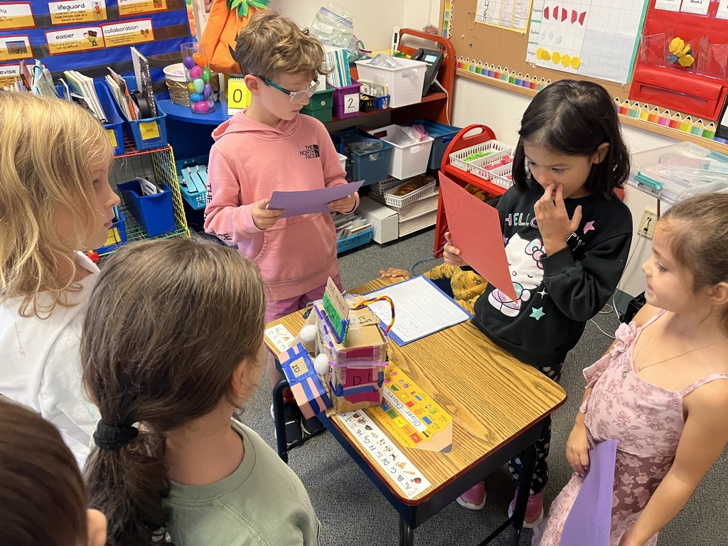 First grade students present projects to classmates