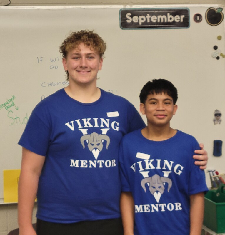 Deacon Carson of Townsend, left, and Jayden Neang of Ayer are among the freshman mentors who welcomed incoming ninth-graders during a day of orientation September 1 at Nashoba Valley Technical High School.