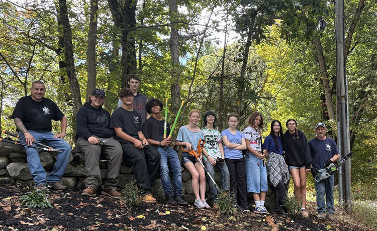 Nashoba Tech freshmen and staff participate in a Day of Service. From left, Assistant Dean Mike Robichaud, Alykzander Gamache Benoit (Pepperell), Jayden Williams (Chelmsford), Demetri Frank (Ayer), Braylon Freeman (Chelmsford), Cassandra Streeter (Townsend), Shaylee Francia (Townsend), Milena Gavrichev (Pepperell), Isabella Picolotto (Chelmsford), Paige Buckley (Pepperell), Lilliana Zografos (Townsend) and Carpentry instructor Tim Ayres.