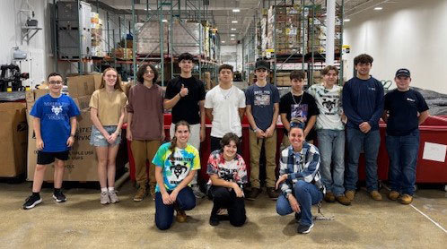 Nashoba Tech freshmen and staff participate in a Day of Service. Front, from left, Jocelyn Gorgenyi (Chelmsford), Kaylee Fleming (Westford) and Cosmetology instructor Sayda Betsold; back, from left, Christopher Graham (Chelmsford), Caylee Surprenant (Groton), Gabriel Hachey (Townsend), Anthony Guerson (Pepperell), Isaak Guzman (Pepperell), Dominic Petraglia (Chelmsford), Eli Granberg (Pepperell), Vincenzo Goodwin (Ayer), Anthony Perreault (Townsend) and Mason Grout (Chelmsford).