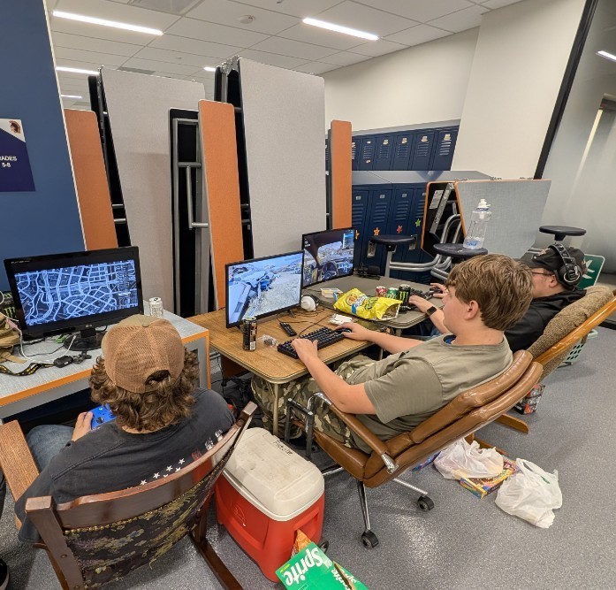 students playing video games to pass the time