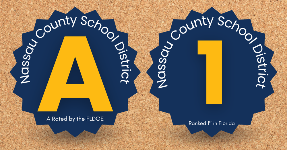 Two blue badge graphics pinned on a corkboard background. The left badge features a large yellow “A” with the text “Nassau County School District” around the edge and “A Rated by the FLDOE” below. The right badge displays a large yellow number “1” with the same surrounding text and the caption “Ranked 1st in Florida” beneath it.
