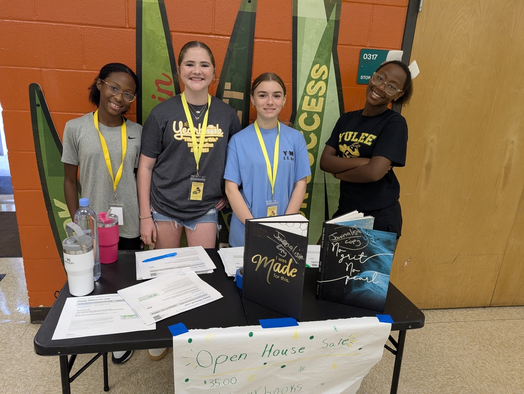 Yearbook students smiling