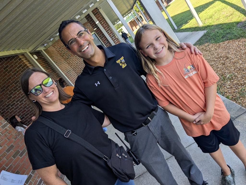 Staff and family smiling