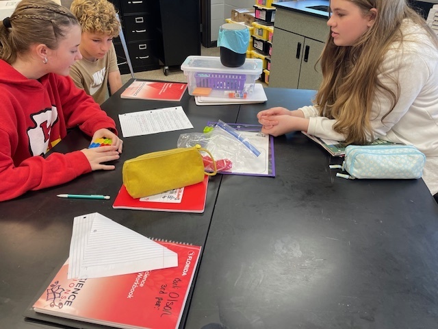 Students working on a science lesson