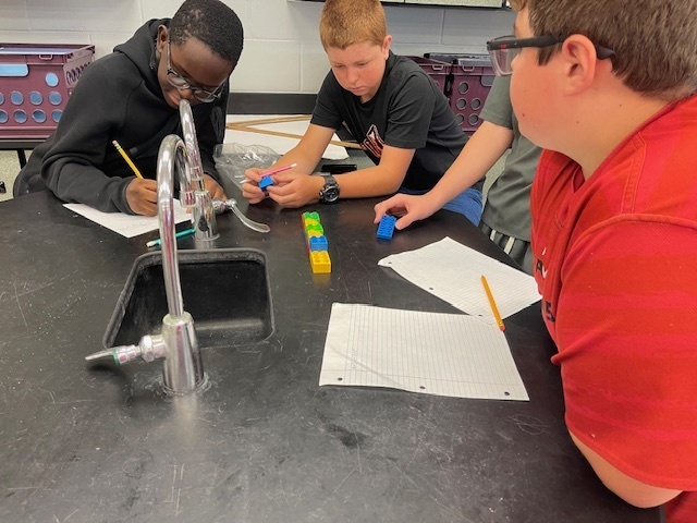 Students working on a science lesson