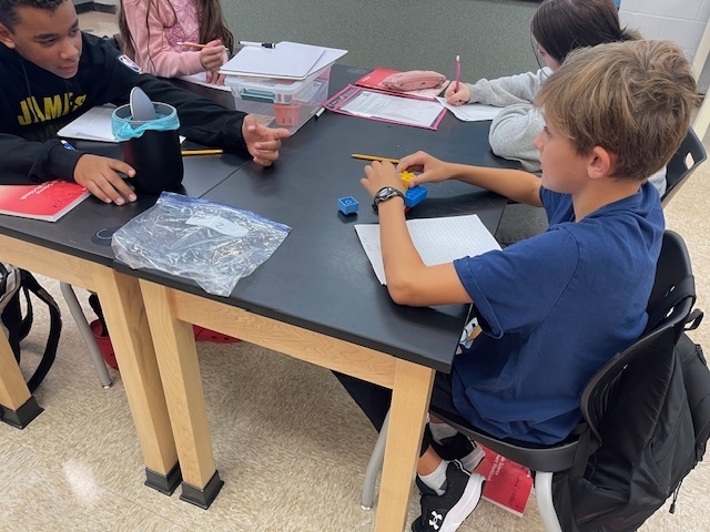Students working on a science lesson