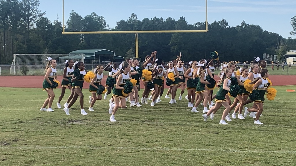Cheerleaders running to the sidelines