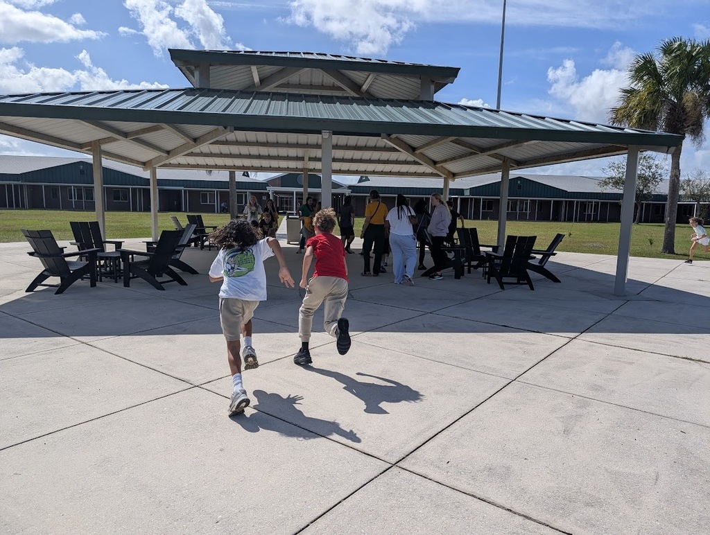 Students running in relay race