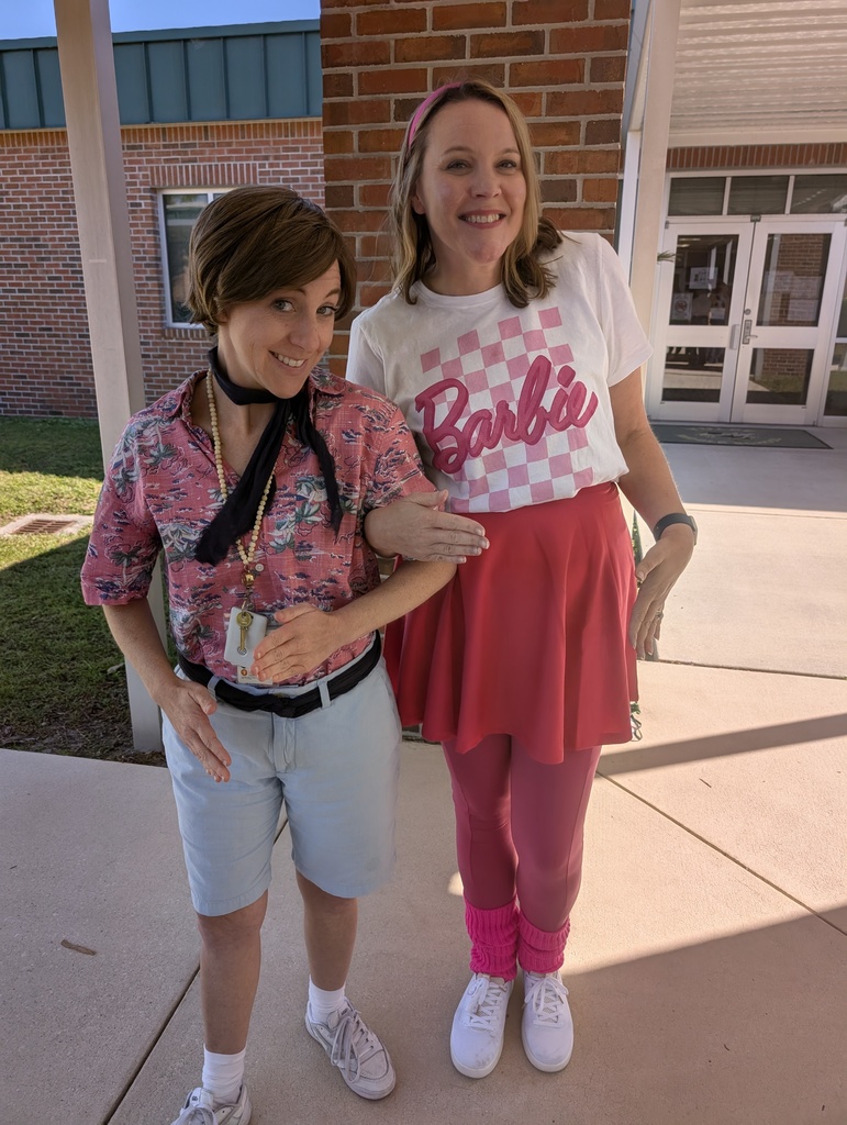 Counselors dressed as Barbie and Ken