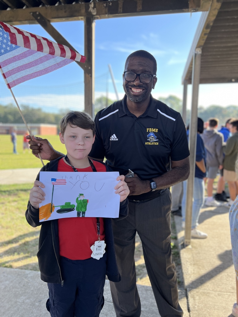Mr. Hardy and a student showing their patriotism.