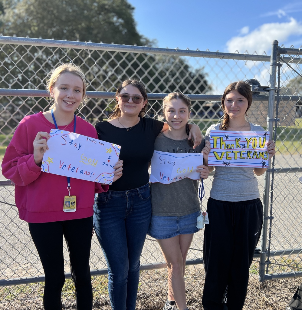 More students with signs.