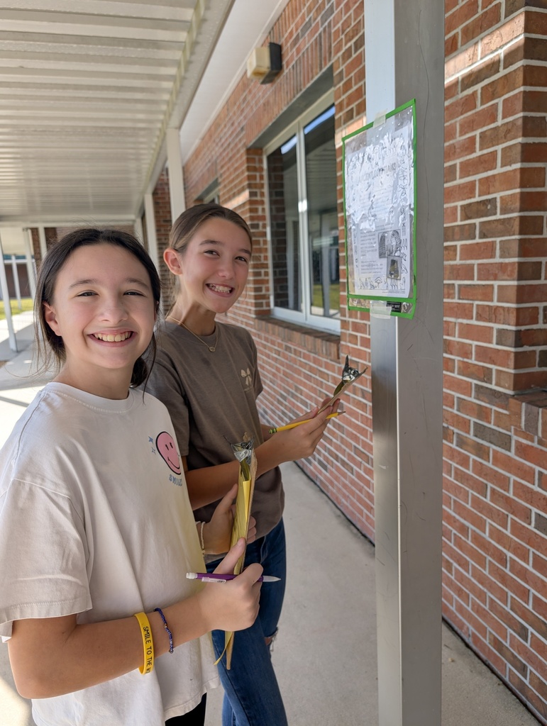 Students learning together outside