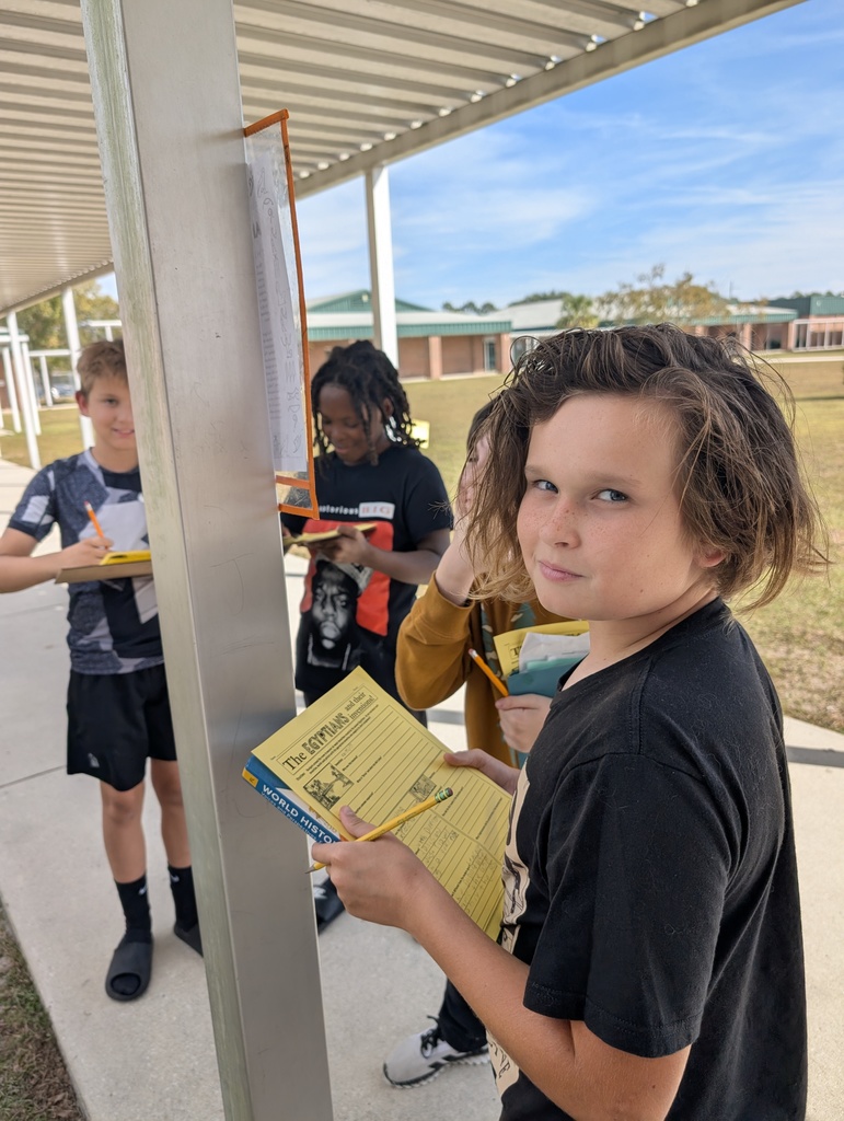 Students learning together outside