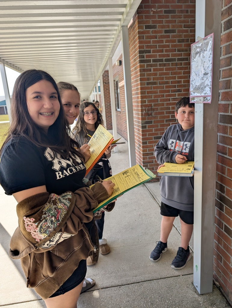 Students learning together outside