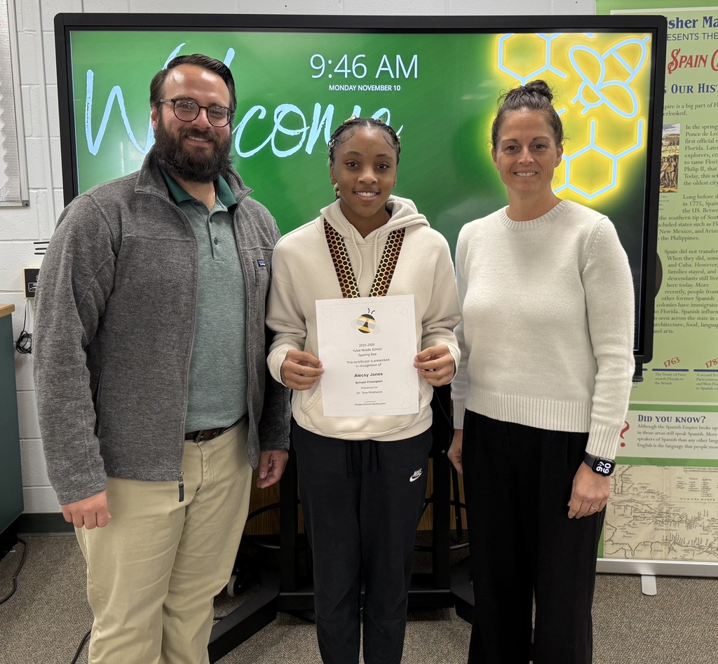 Spelling Bee Champion posing with the APs