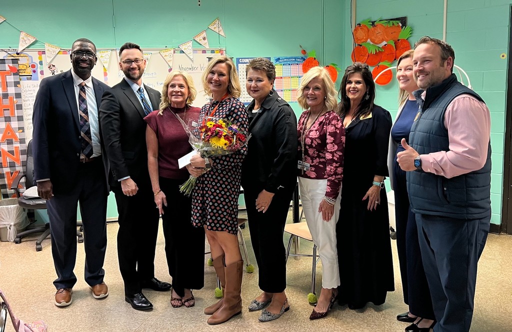 Mrs. Opalinski receiving her award.