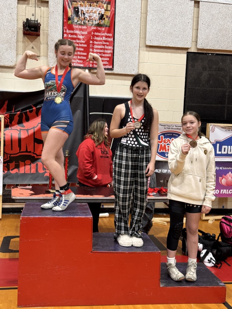 Wrestlers at the podium