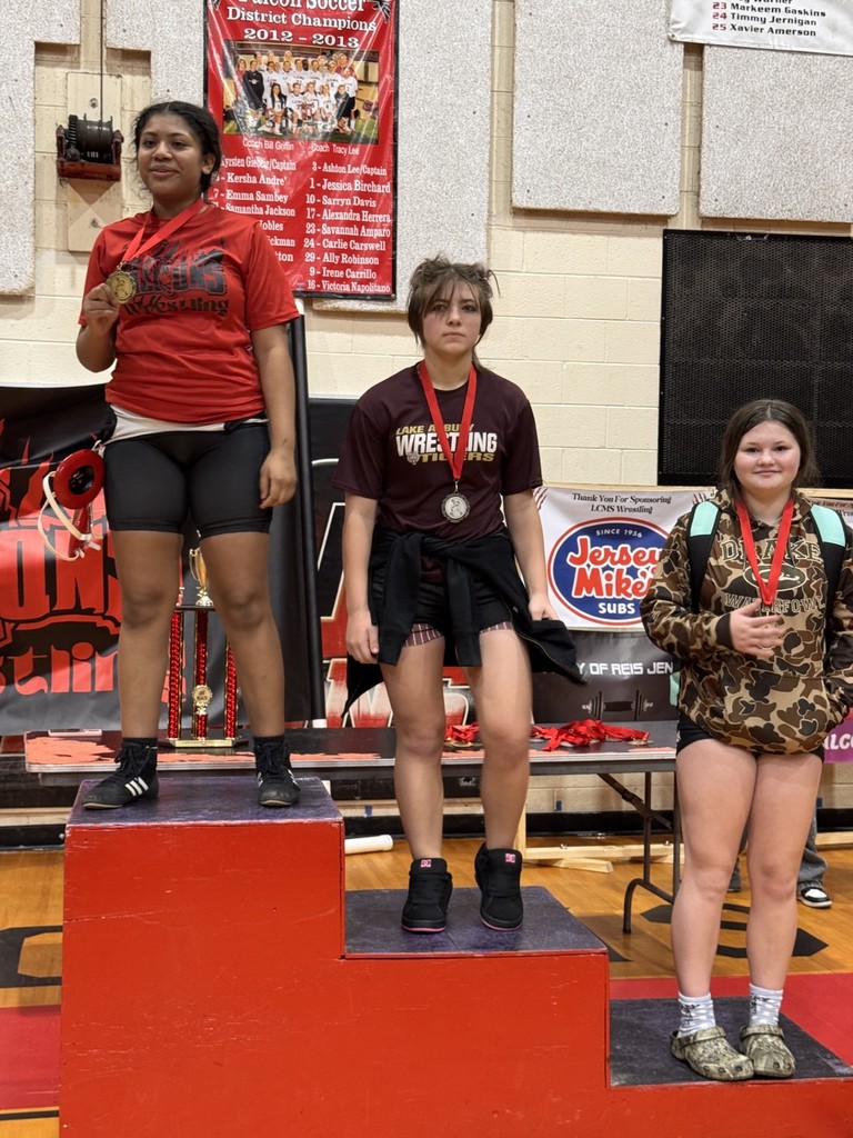 Wrestlers at the podium