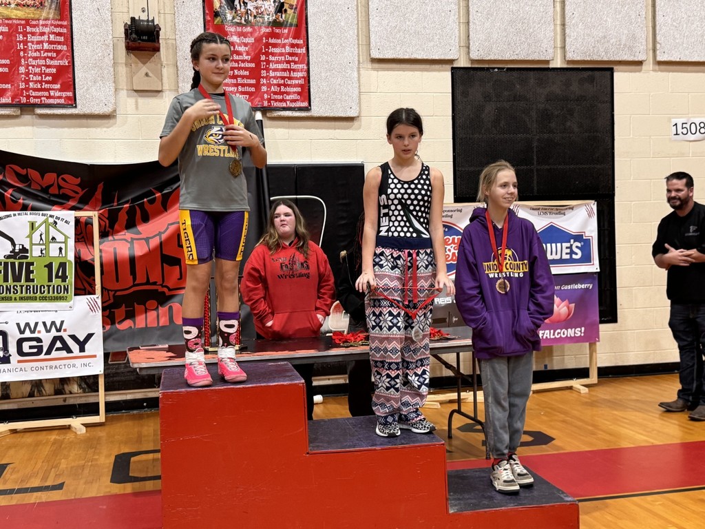 Wrestlers at the podium