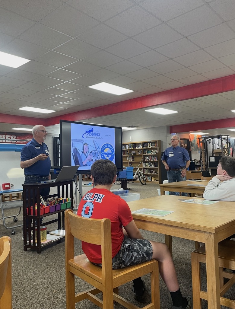 Two presenters speaking.