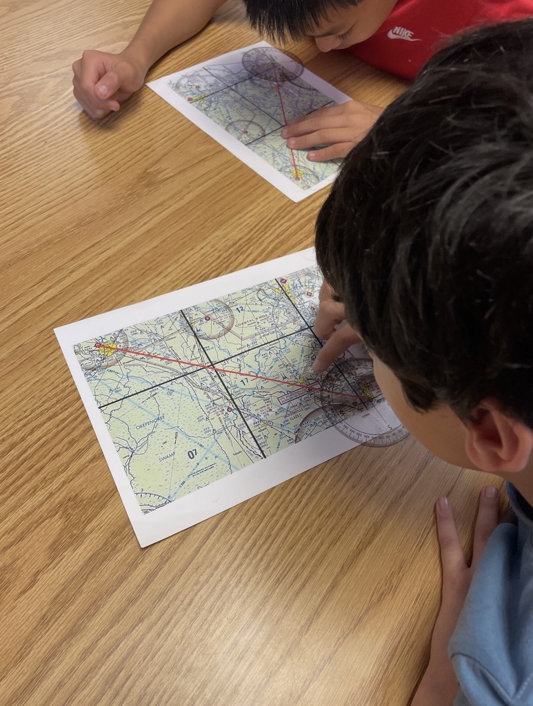 Students working on aviation map.