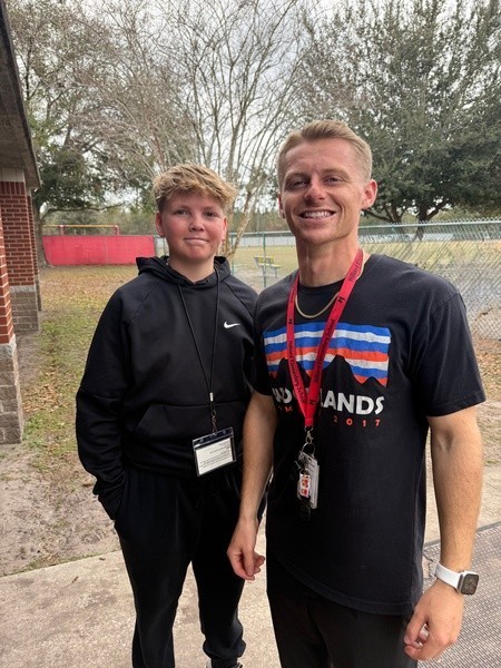 Student working with Career Shadow Employee