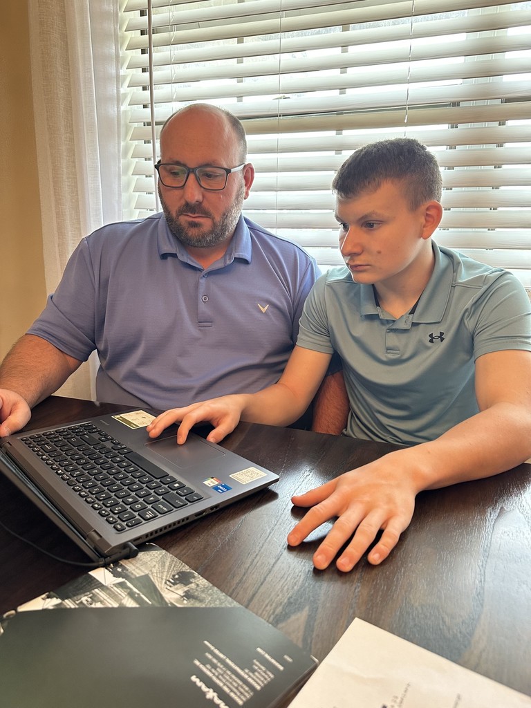 Student working with Career Shadow Employee