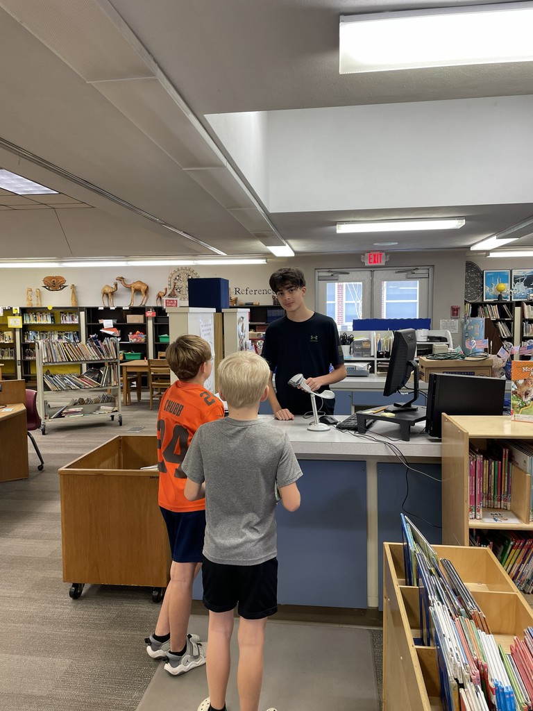 Student working with Career Shadow Employee