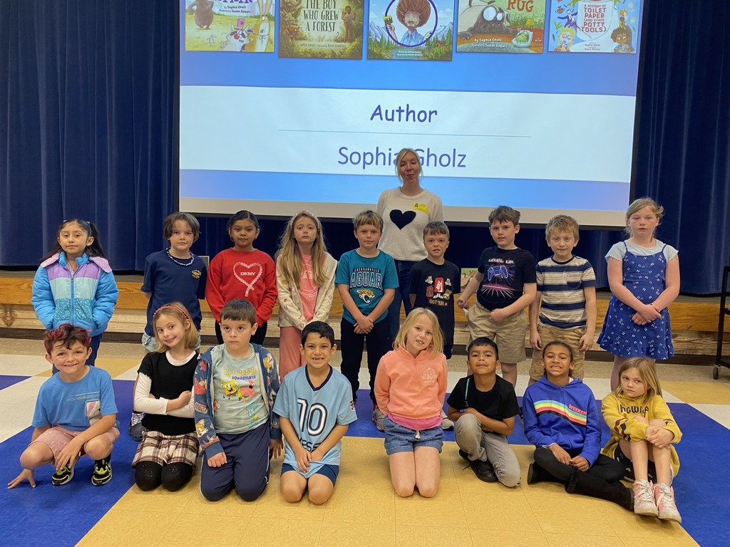Author Sophia Gholz pictured with  Southside Elementary School students as part of the Amelia Island Book Festival's Authors In Schools Program