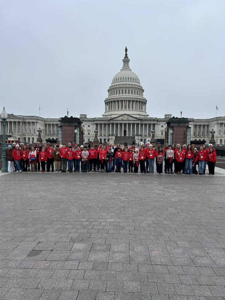 Hilliard Elementary School fifth grade safety patrol students stand together in front of the United States Capitol building in Washington, D.C., during an educational trip to learn about American history and government.