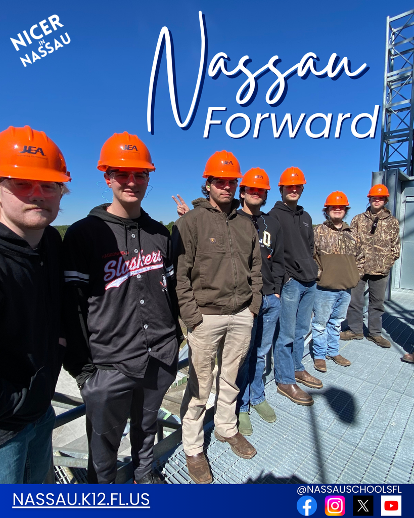 High school students wearing safety helmets stand together during a career or technical learning experience at an industrial site. The graphic reads “Nassau Forward” with the Nassau County School District website and social media information.