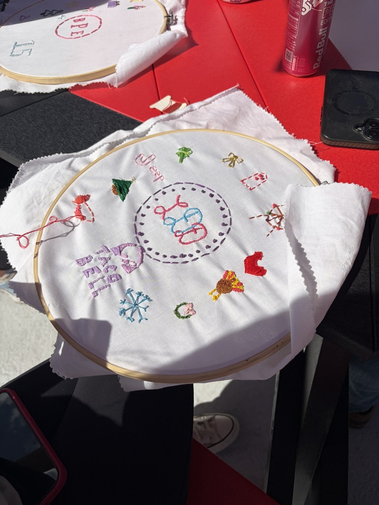 Student working on a hand embroidery memory project.