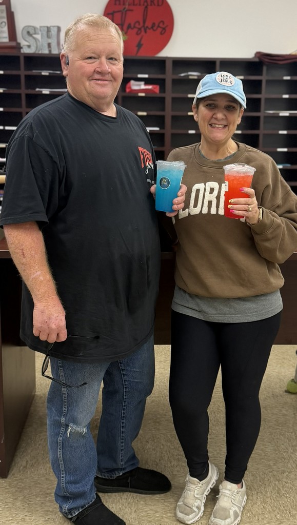 Easy Peasy owners posting with lemonade.