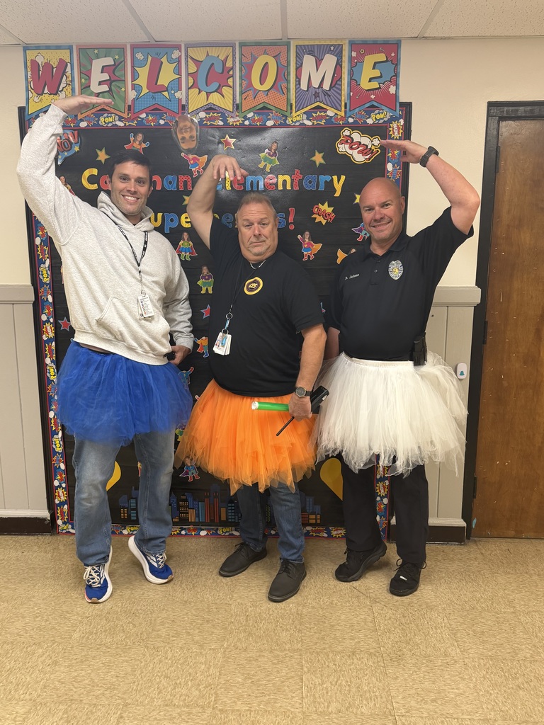 Mr. Thompson, Mr. Allen, and Officer Johns wearing their tutu's at CES.