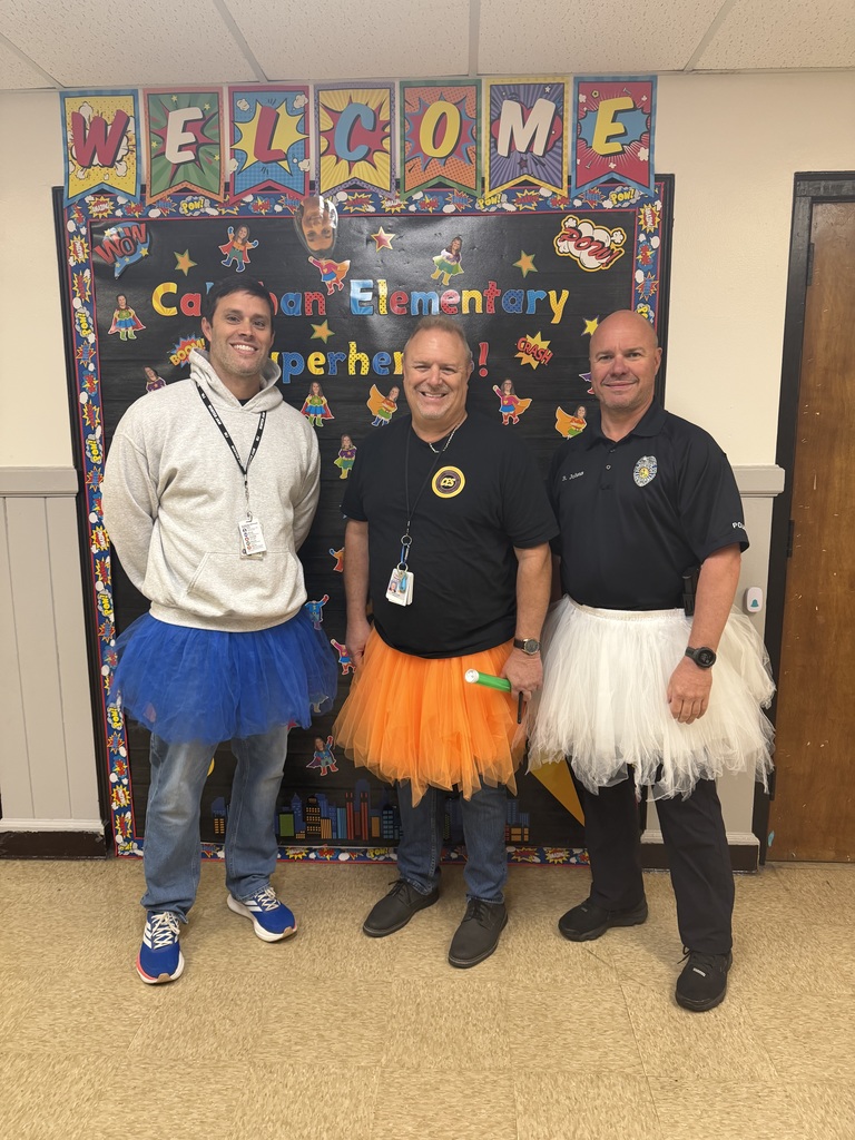 Mr. Thompson, Mr. Allen, and Officer Johns wearing their tutu's at CES.