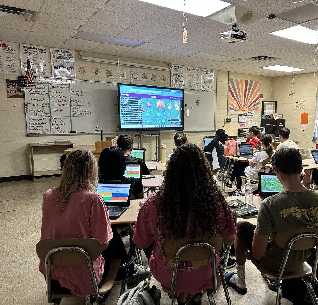 Students working on Geometry problems.