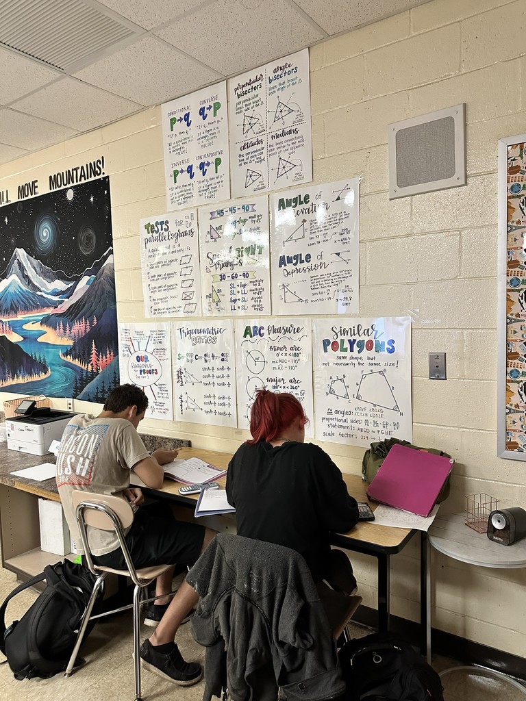 Students working on Geometry problems.