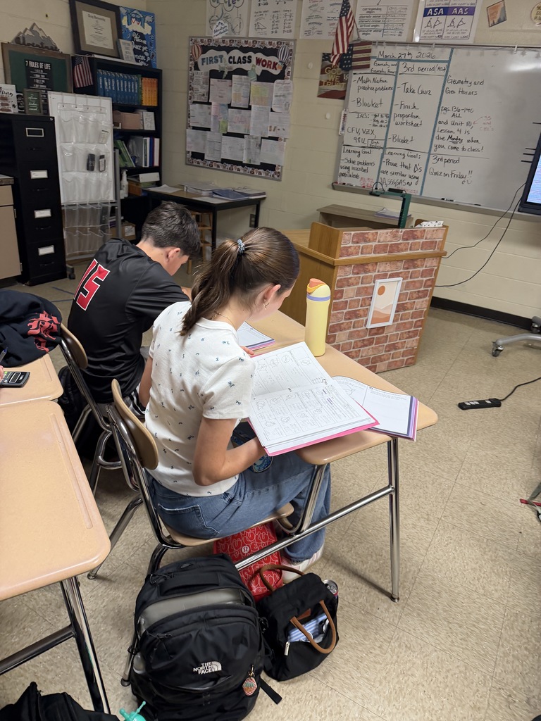 Students working on Geometry problems.