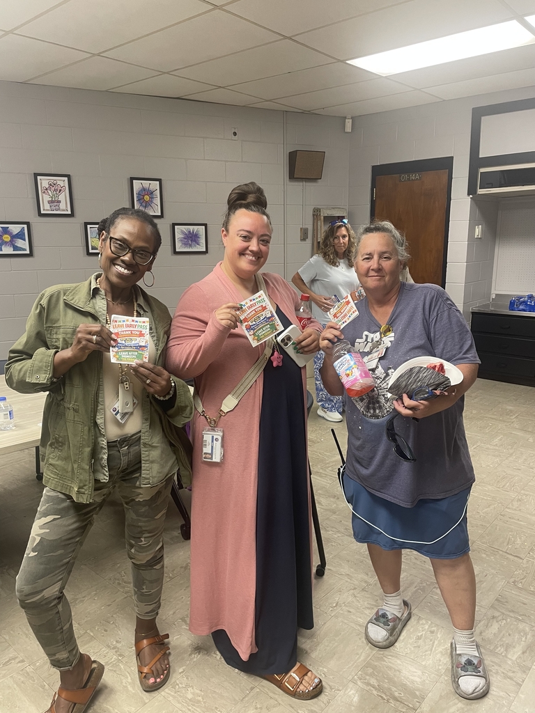 Picture of three paras holding their leave early passes. 