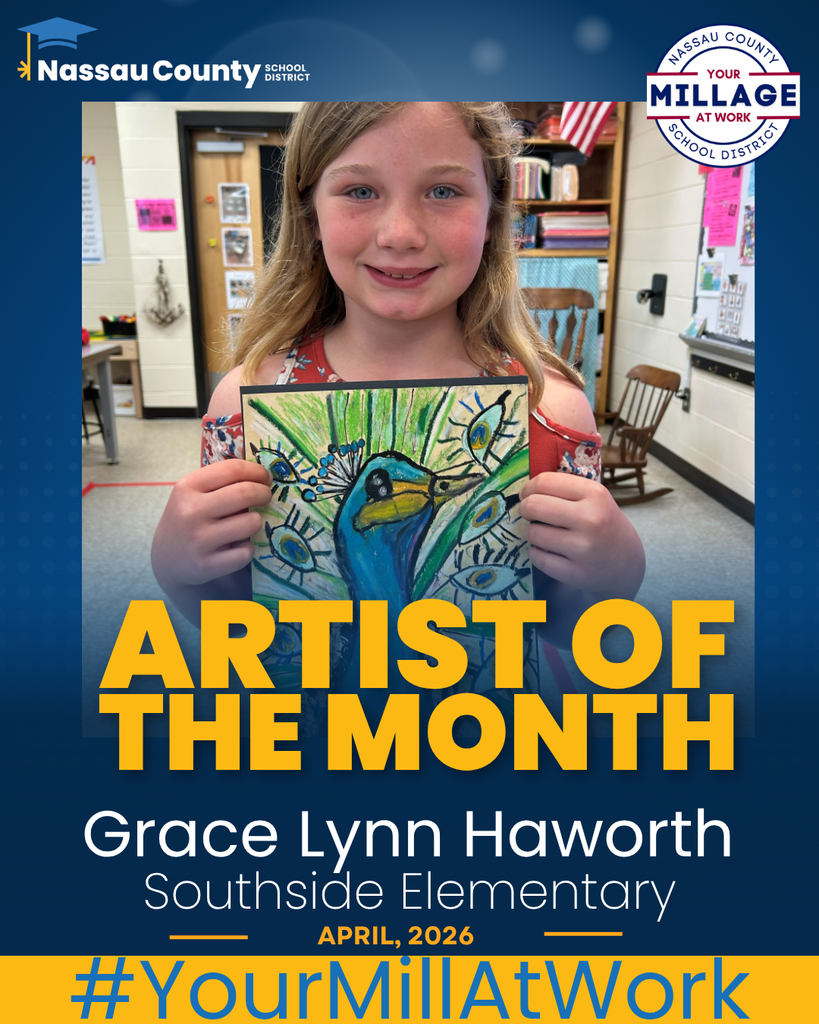Picture of artist of the month Grace Lynn Haworth holding her artwork. A pastel picture of a peacock.