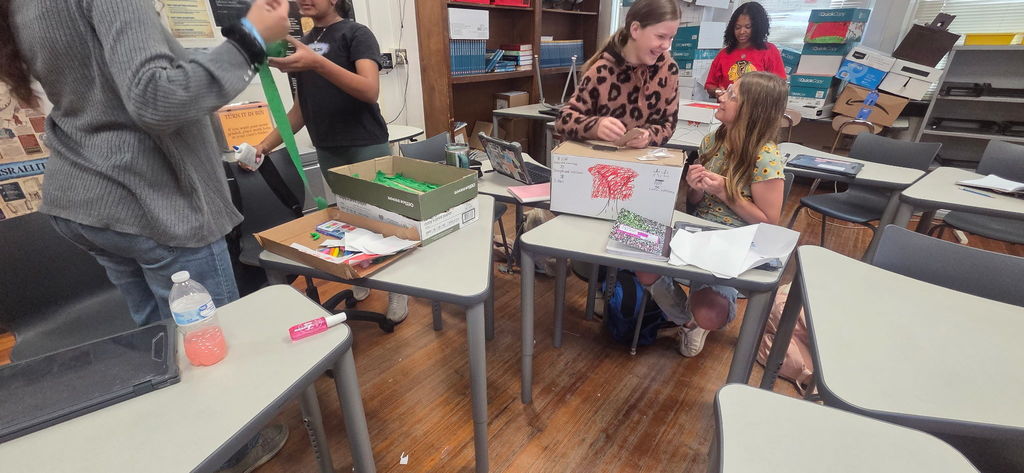 Students actively working on project.