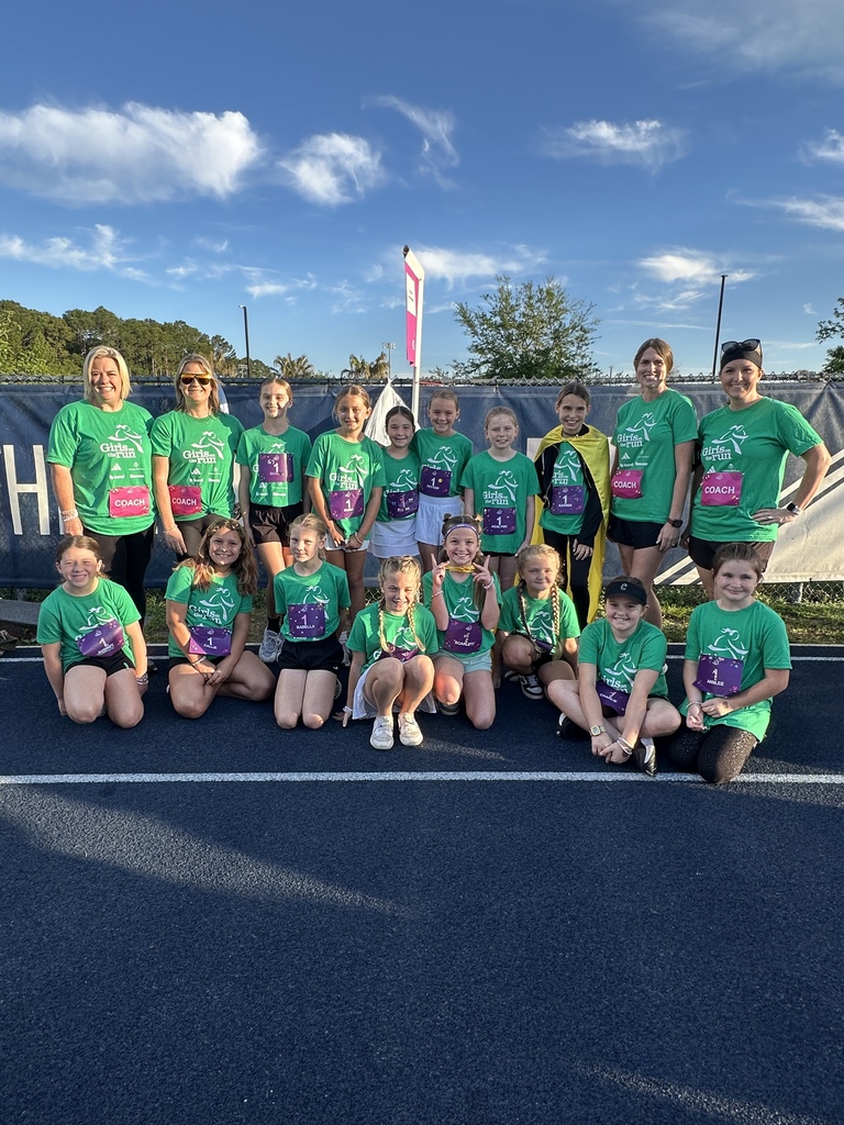 Students and parents  at the Girls on the Run track before the race