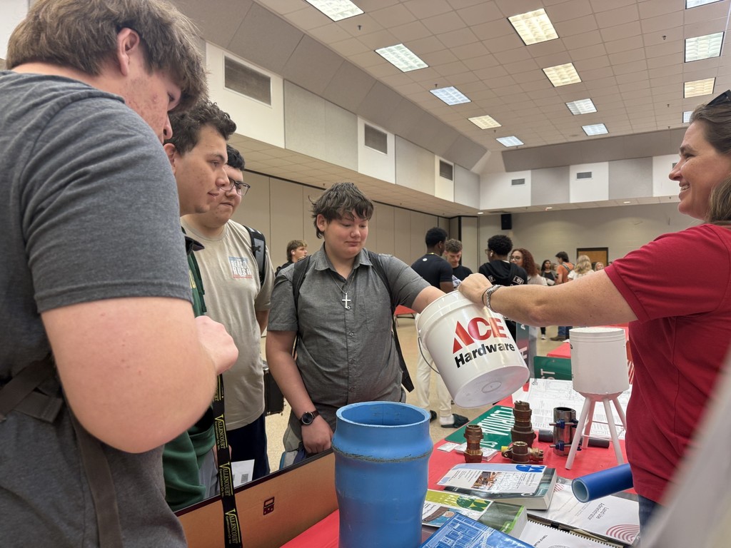 Students meeting with employers at HMSHS Career Fair.