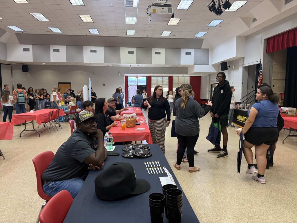 Students meeting with employers at HMSHS Career Fair.