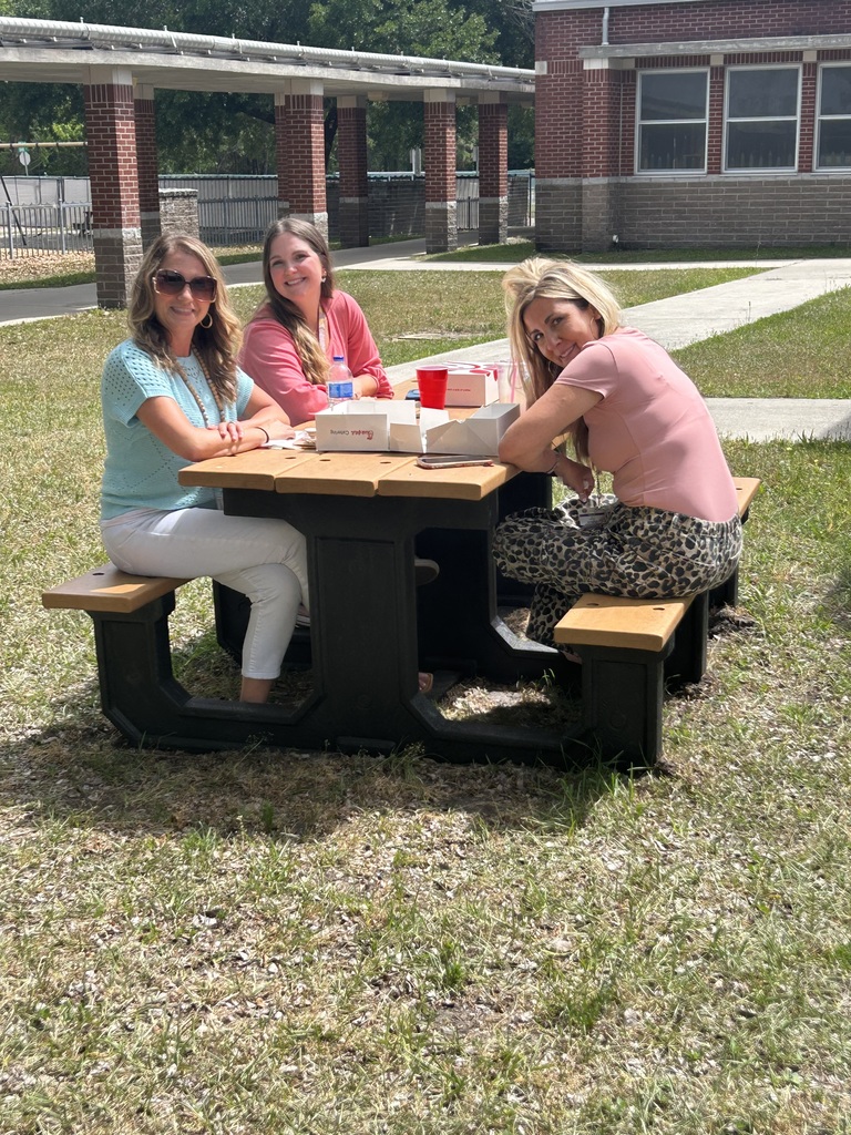 Staff enjoying lunch outside.