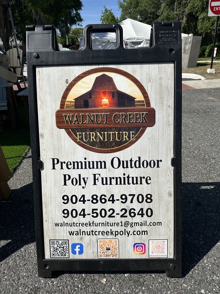 A sign for Walnut Creek Furniture displays the business name, contact phone numbers, email, website, and social media icons for premium outdoor poly furniture.